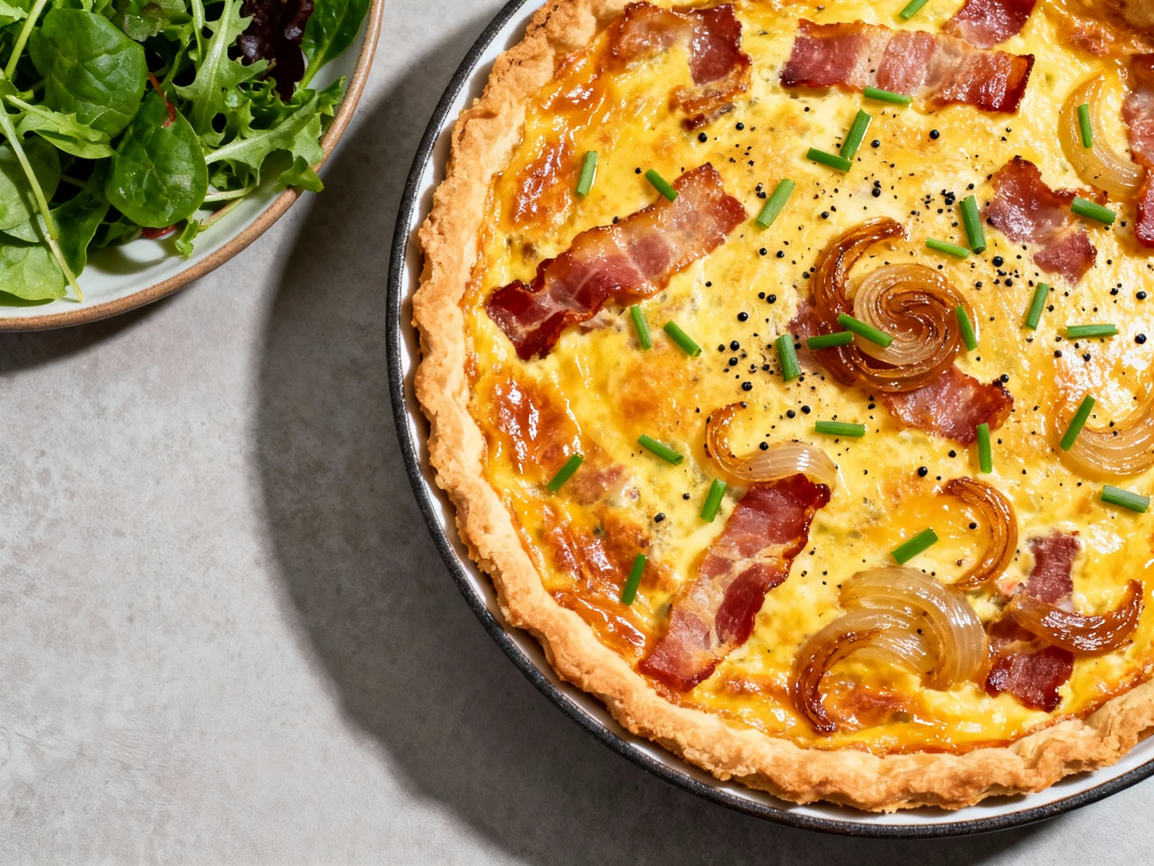 Food photography, Overhead shot of baked Quiche Lorraine: golden, glossy top with bacon and caramelized onions peeking t
