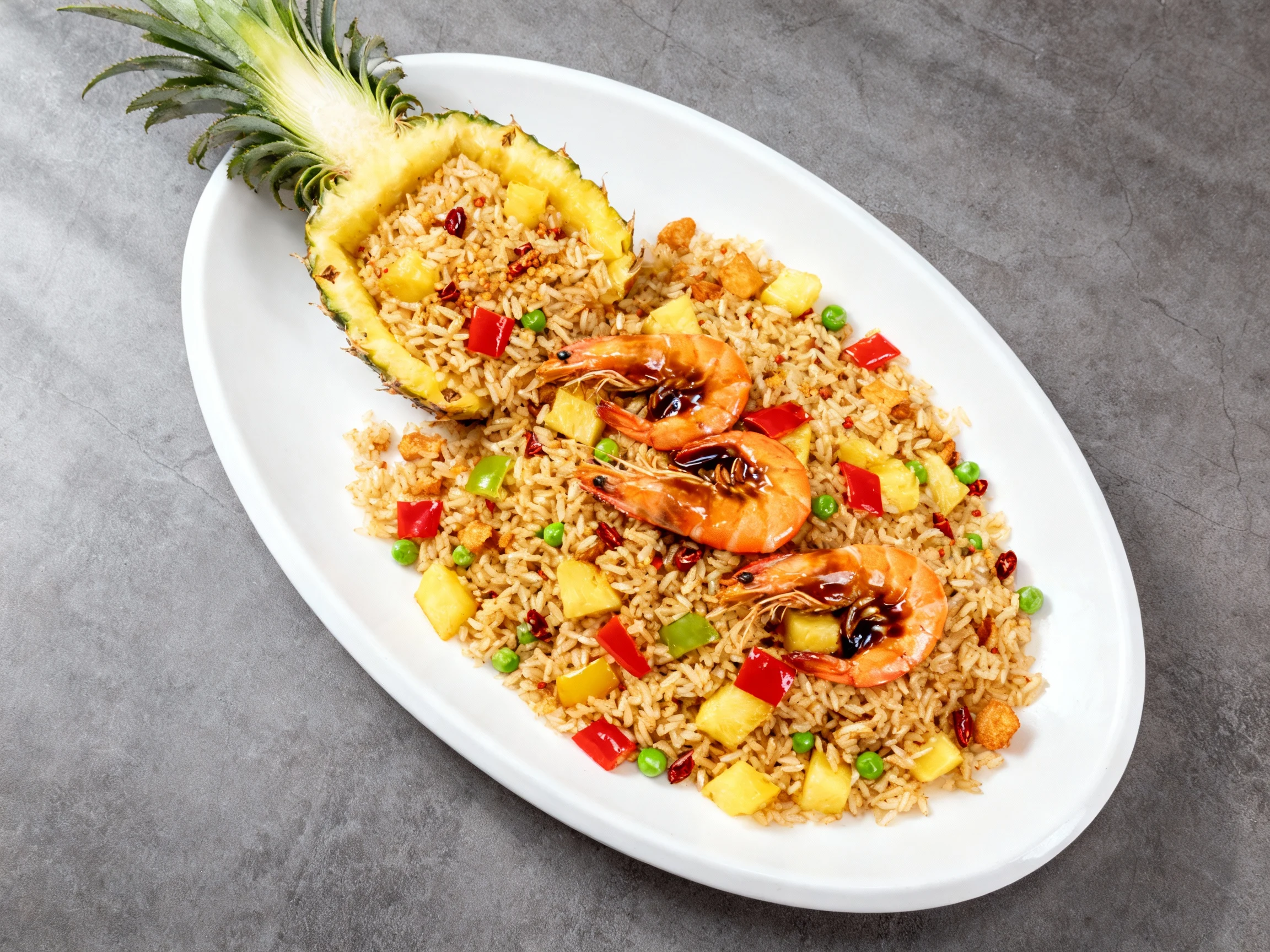 Food photography, Overhead shot of shrimp + pineapple fried rice variation: evenly distributed crispy rice bits, bright 