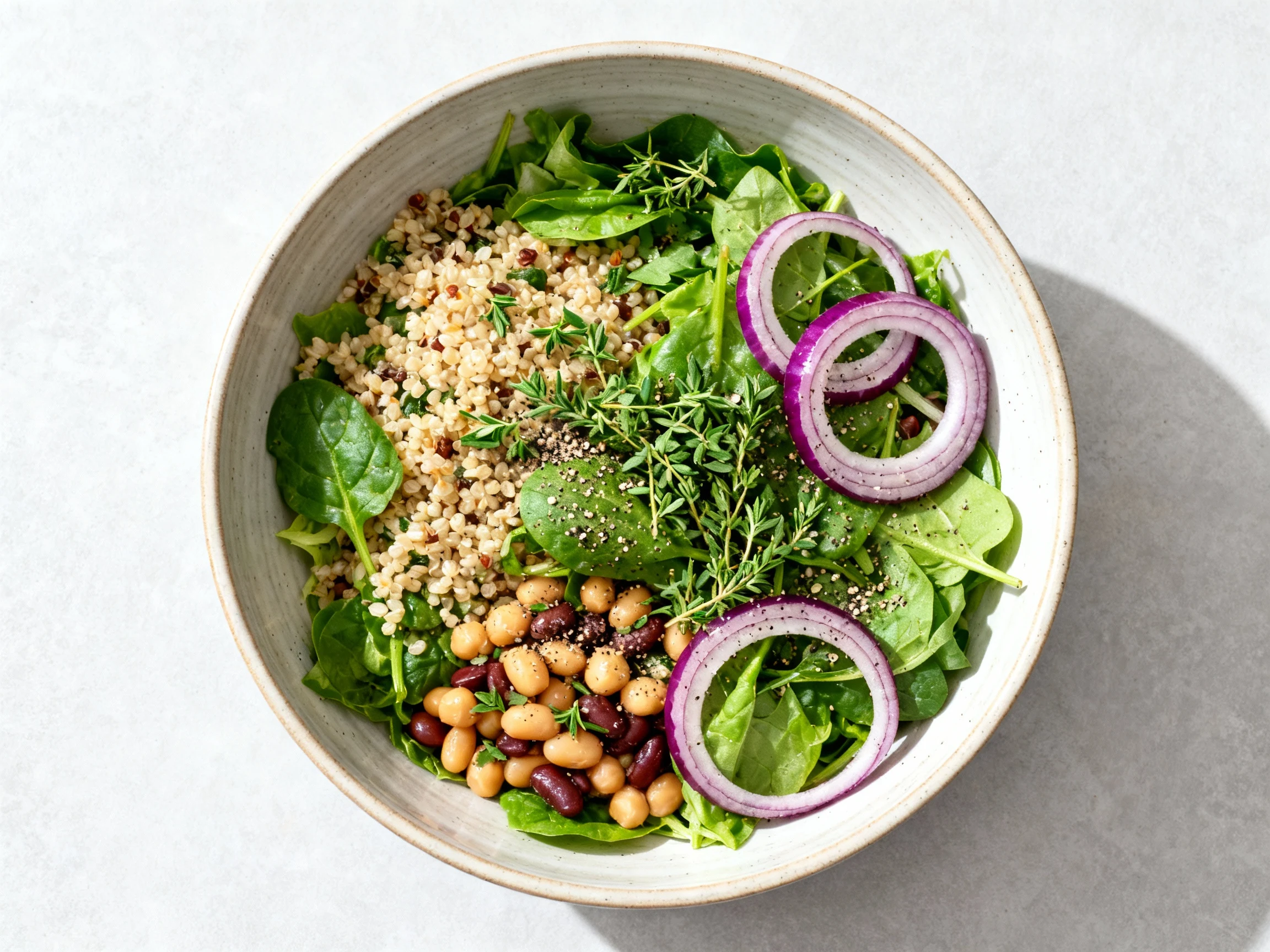 Food photography, Overhead shot of the fully assembled Blue Zone salad in a wide ceramic bowl, showing the balanced mix 